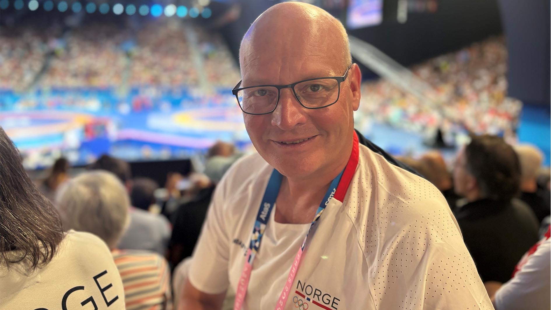 Nils Einar Aas mener dagens omfordeling av olympiske inntekter bygger på en internasjonal solidaritetsmodell som kommer alle de globale idrettene til gode. Her fra åttendelsfinalen i bryting under OL i Paris. Foto: Norges idrettsforbund